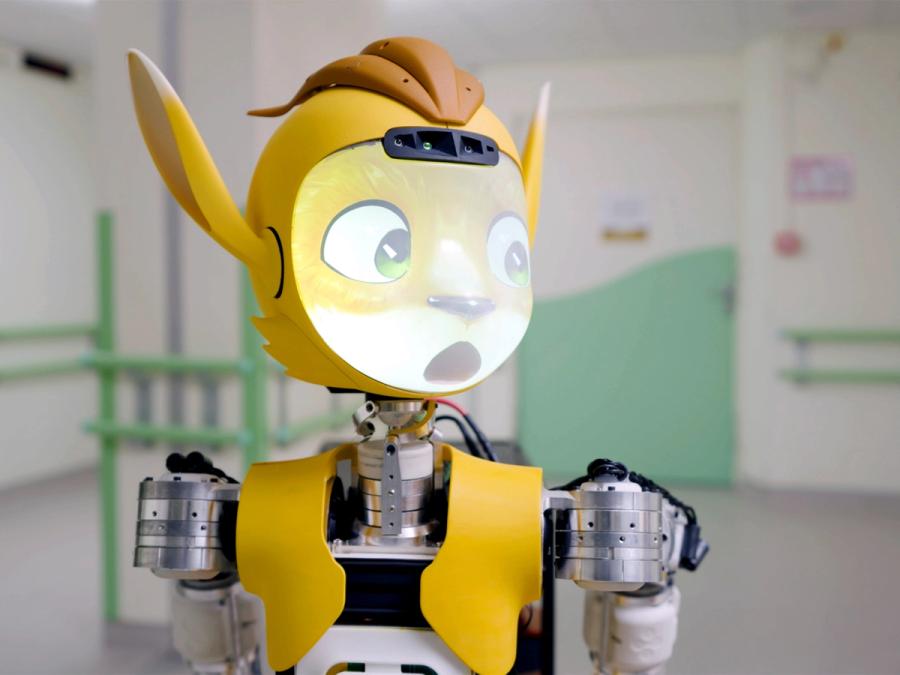 Close-up of a fox-like robots face displaying a shocked expression.