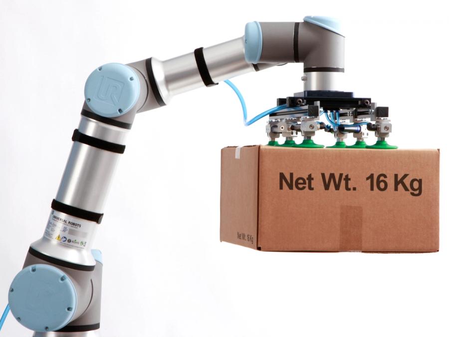 A more advanced model of the silver and blue articulated arm, ends in a plate with six suction cups which holds up a cardboard box.