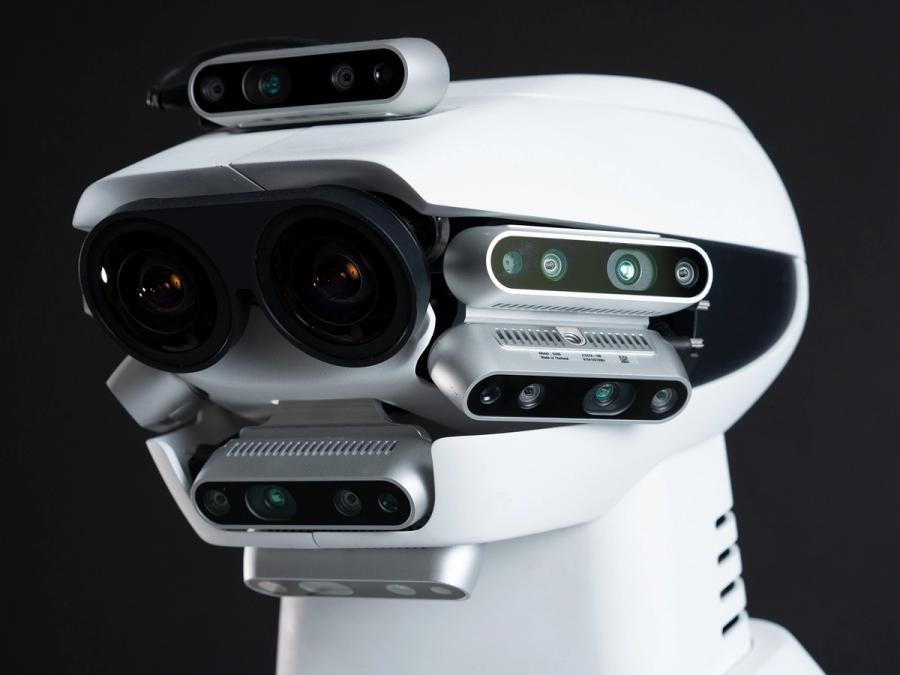 A close-up of the GITAI G1 robots' head highlighting a multitude of cameras and sensors.