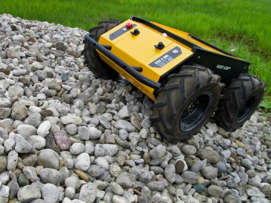The robot is barely taller then it's four rugged wheels.