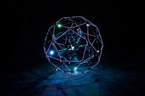 Watch Flyability's Flashy Drones Dance Around a Forest at Night